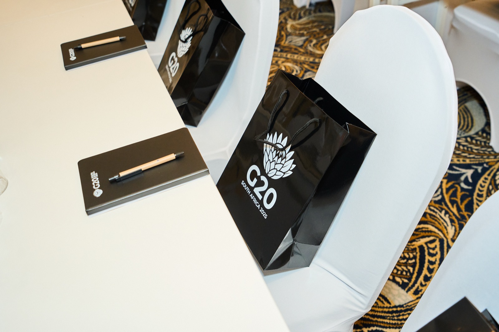A G20 delegate bag set on every chair