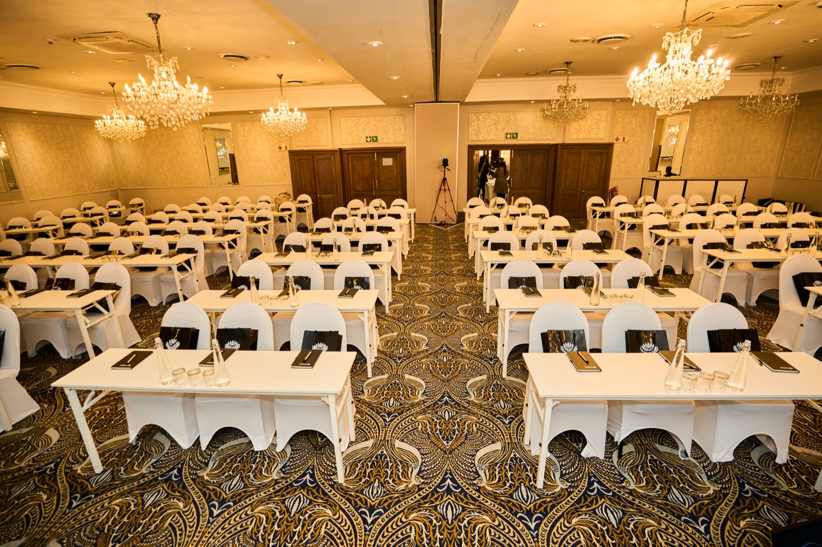 A conference room set and ready before the first guest arrives