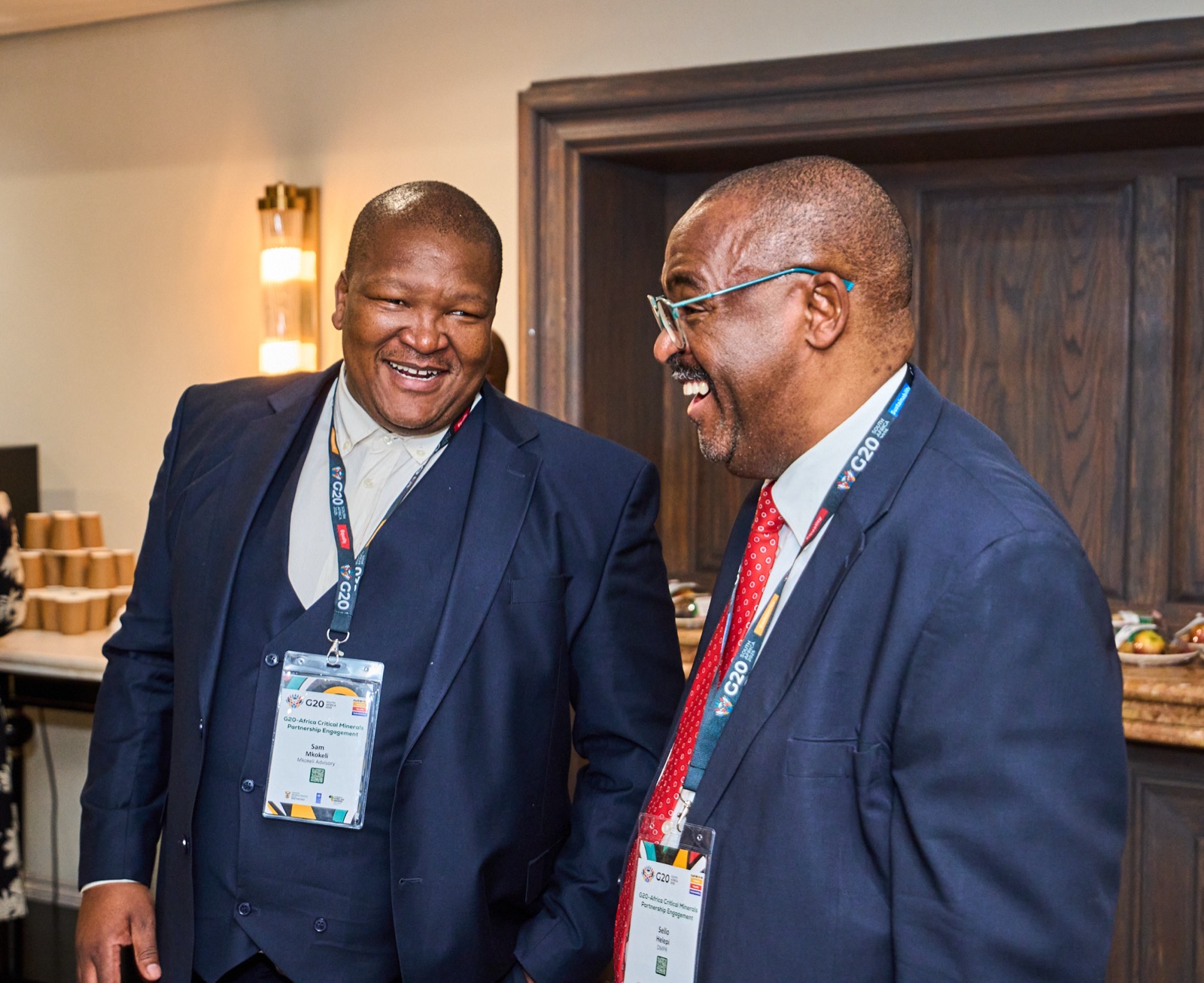 Two delegates smiling for the camera