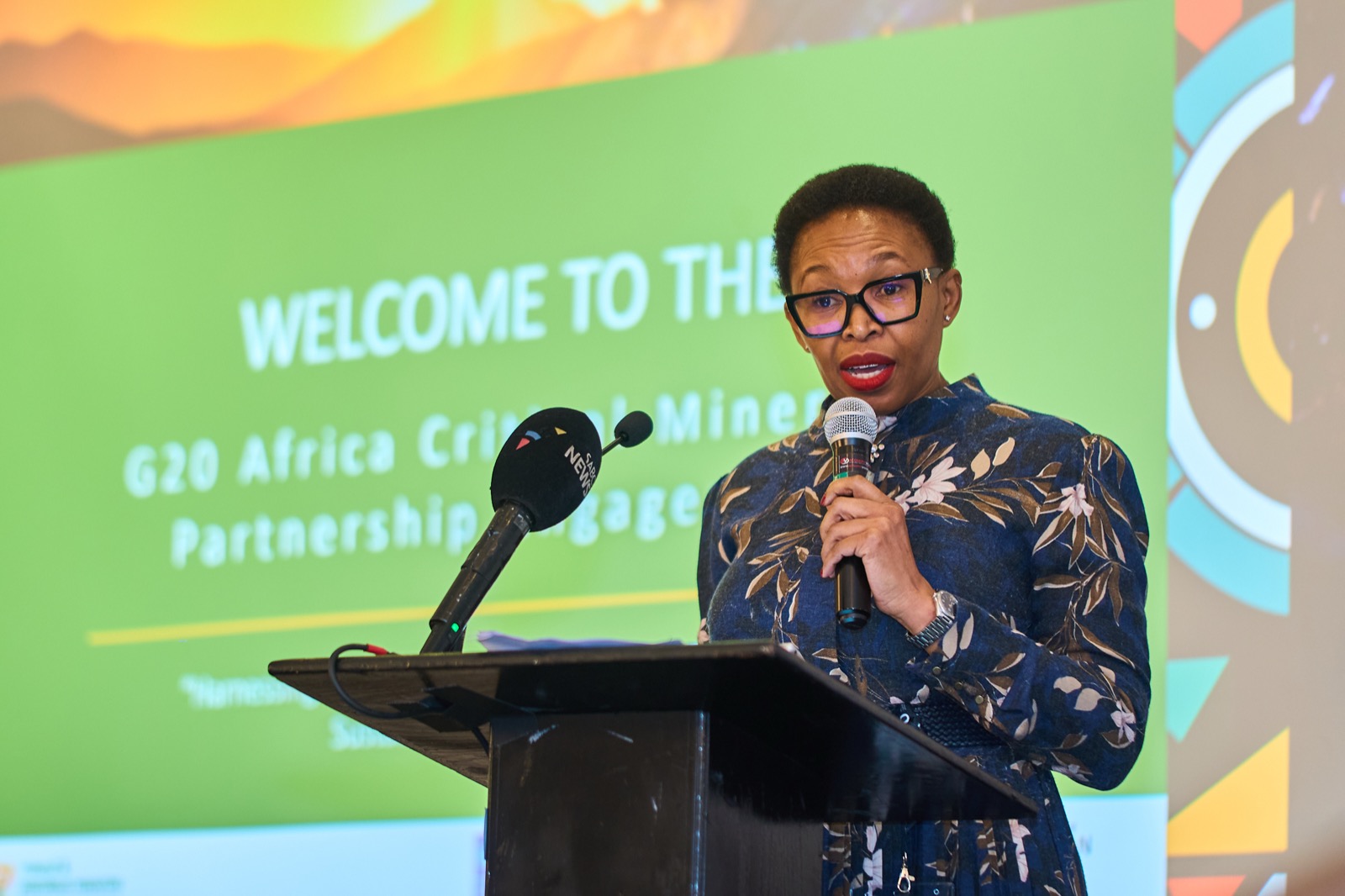 A speaker addressing delegates from the podium