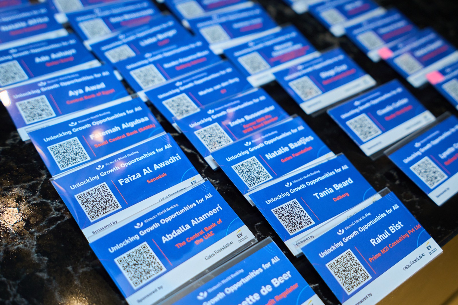 Branded cards laid out for the delegates