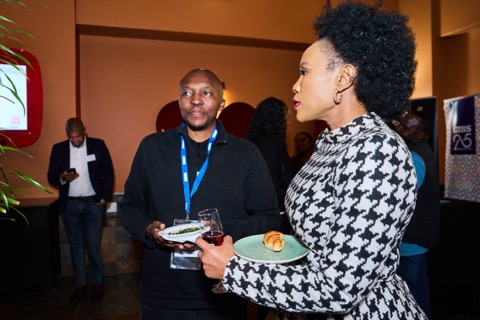 Award handshake at the Cyril Ramaphosa Foundation