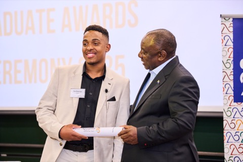 Certificate moment at the Cyril Ramaphosa Foundation